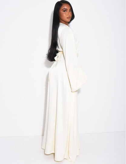 ABAYA PREMIUM À BORDURES PERLÉES ET CEINTURE ASSORTIE ECRU - EmnaBaya